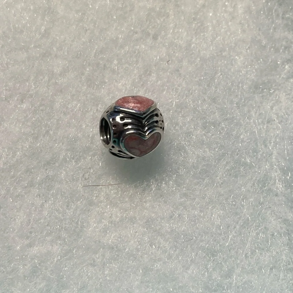 EUC Pandora Rose Enamel Hearts Charm Retired. In excellent condition.